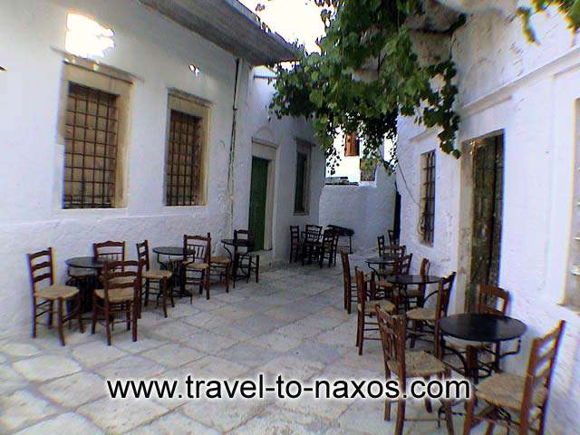 APIRANTHOS COFFEE SHOP - Traditional Greek Kafeneio in a narrow street in Apiranthos.