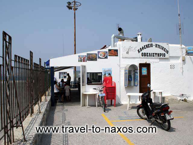 NAXOS PORT - Kafeneio in Greek means coffee shop, however this one will remain in our mind for grilled octapus and souma (the local spirit)